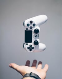 gaming pad levitating above the opened hand